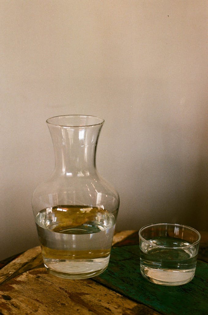 Clear Glass Pitcher With Water Beside A Glass || Hoodoo Waters and their Spiritual Significance
